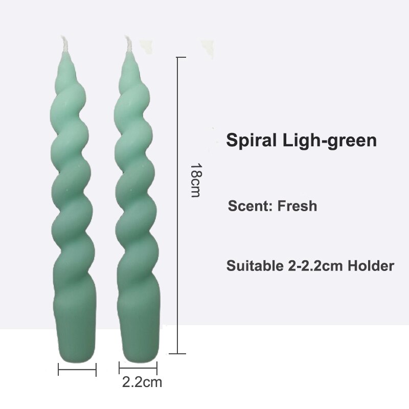 Decorative Pair of Twisted Pillar Candles with a rich hue of light green, showcasing intricate design.