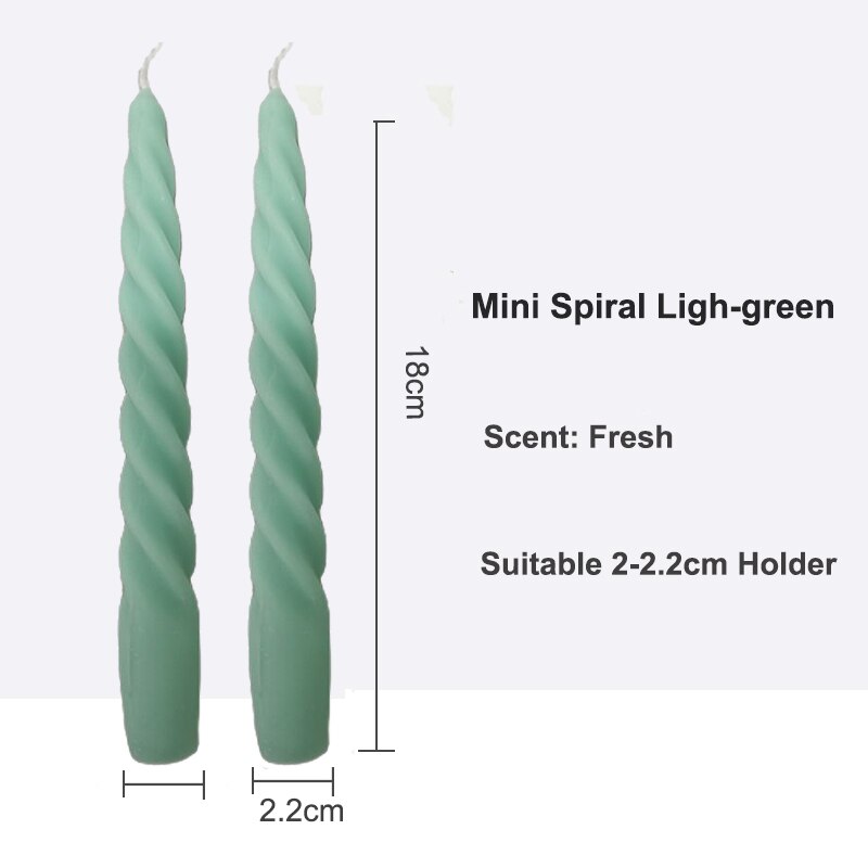 Decorative Pair of Twisted Pillar Candles with a rich hue of light green, showcasing intricate design.