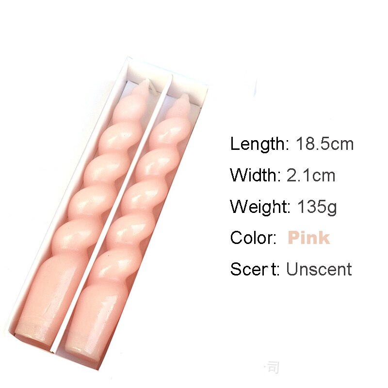 Pair of Twisted tall candle with a rich hue of light pink, showcasing intricate design.